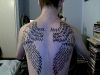 angel wings tattoo on back